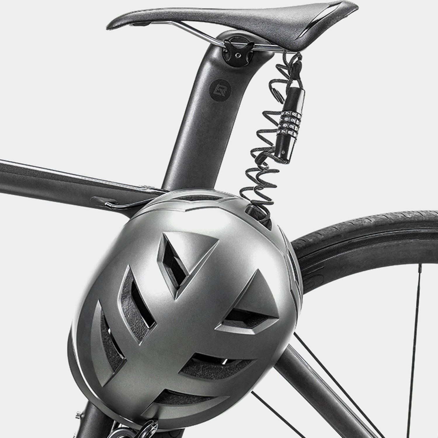Image of the 4 digit combination lock securing a helmet to the seatpost of a bike