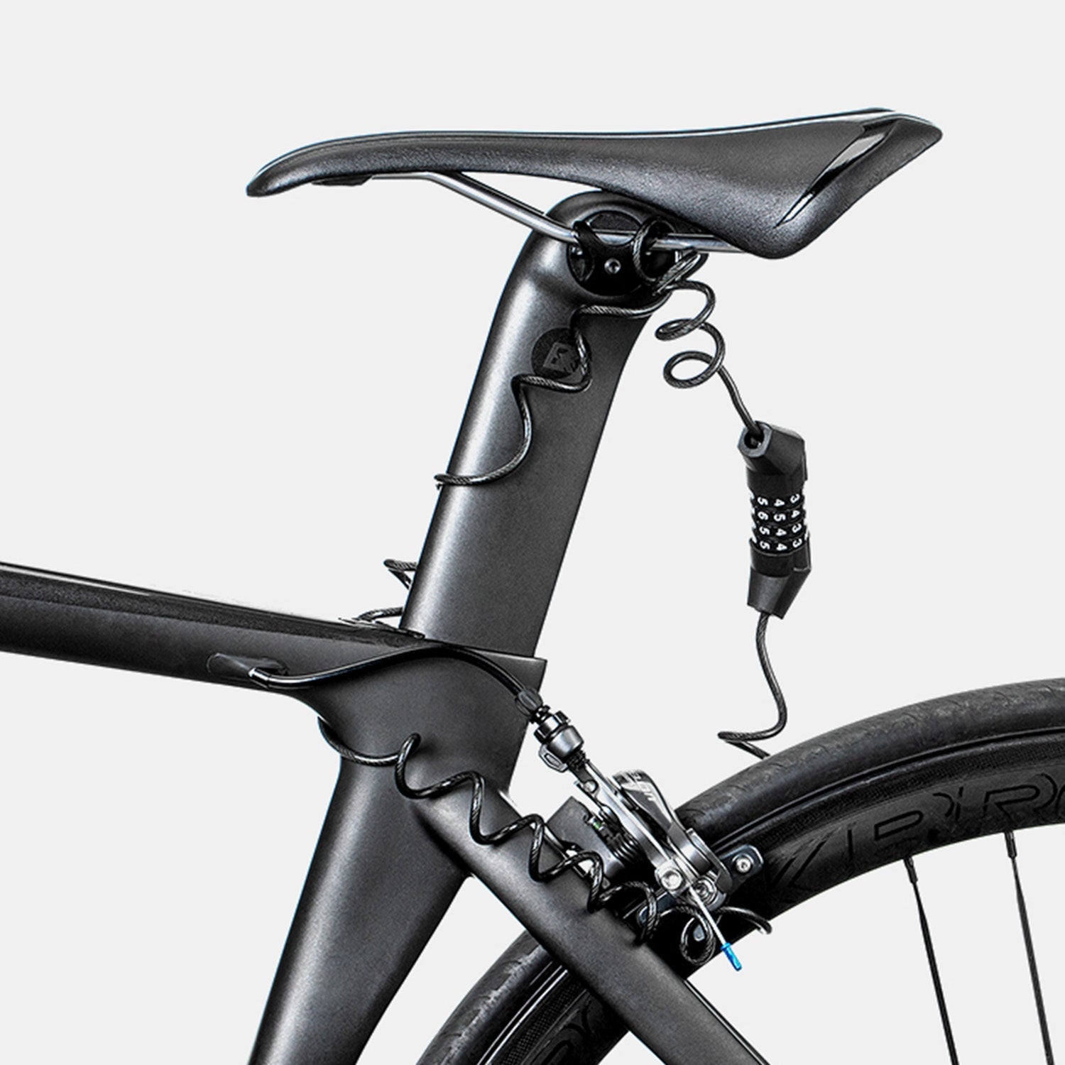image of the 4 digit combination lock attached to the seatpost and rear wheel of a bike preventing movement