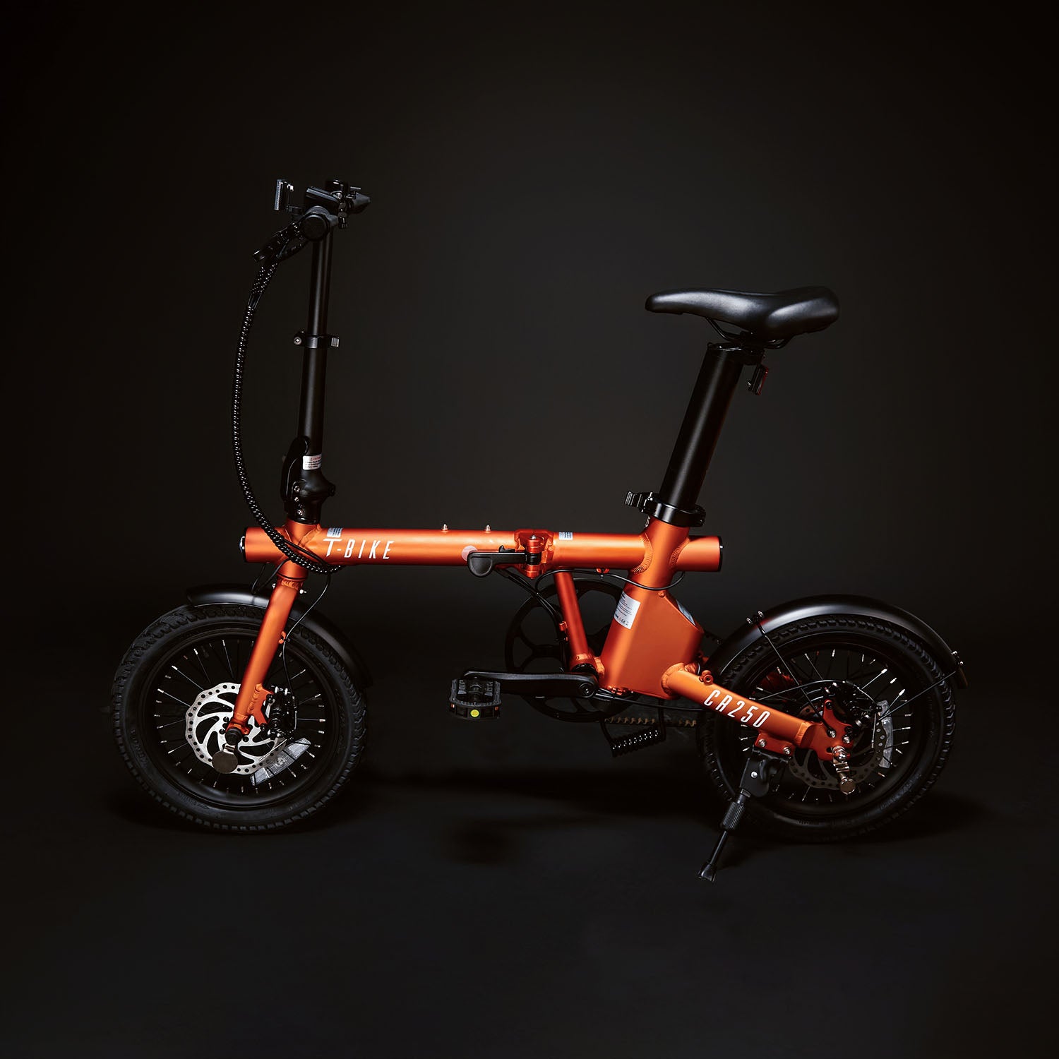 Image of the orange Compact Rider 250 viewed from the side