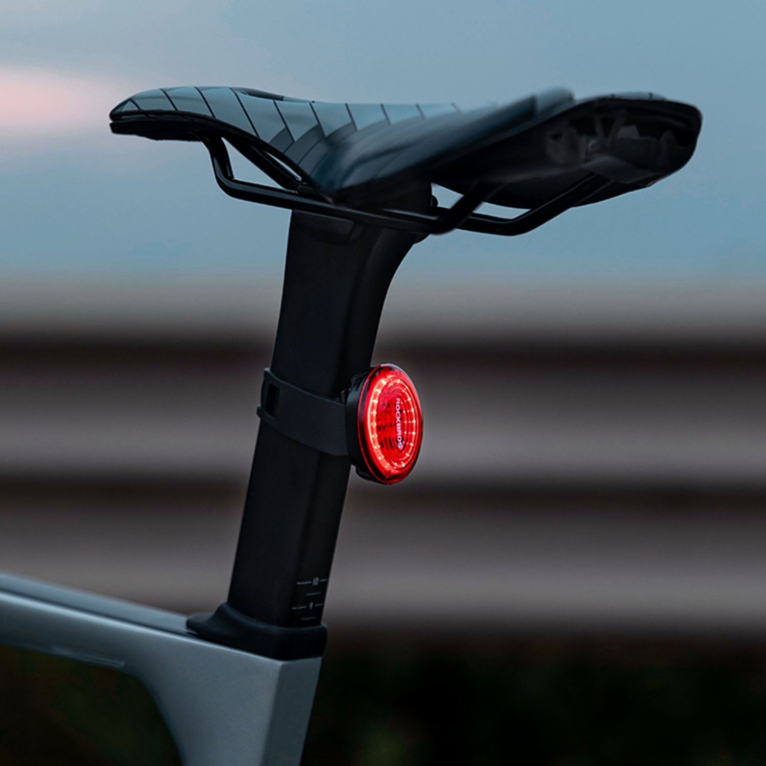 Image of a tail light attached to the seatpost of a bike