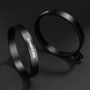 Image of two aluminium cup holders next to each other